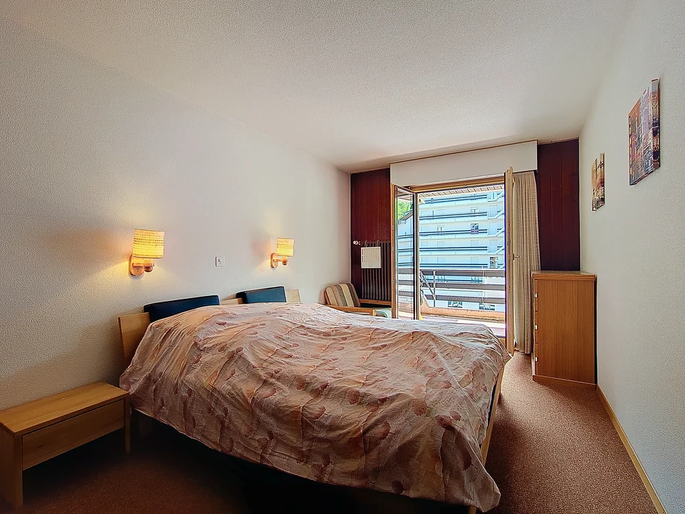 Schlafzimmer mit Balkonzugang