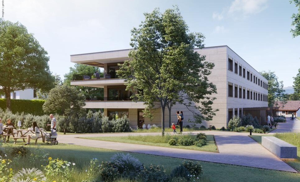 Moderner Wohnbau mit begrüntem Außenbereich