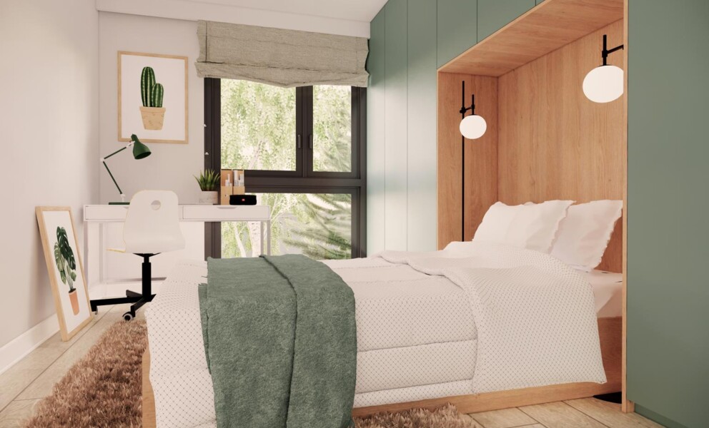 Helles Schlafzimmer mit Homeoffice-Ecke