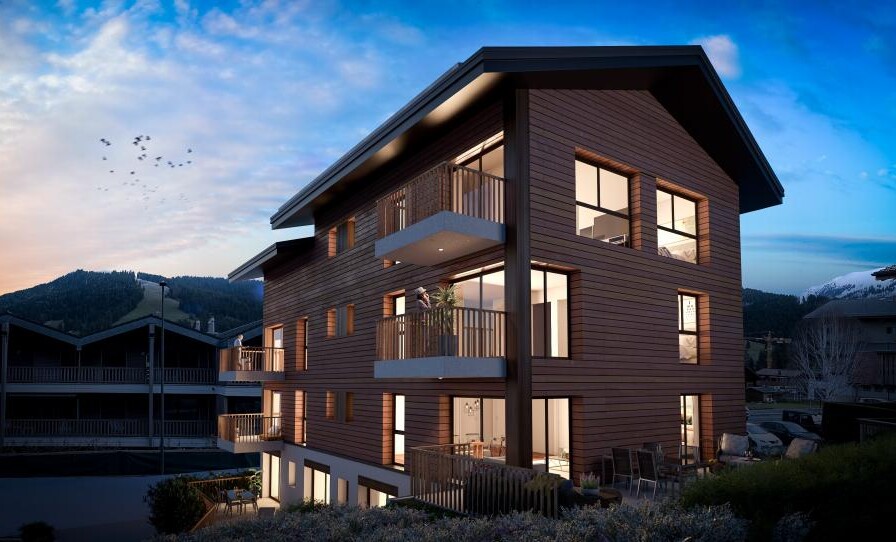 Moderne Holzfassade mit Balkonen bei Dämmerung