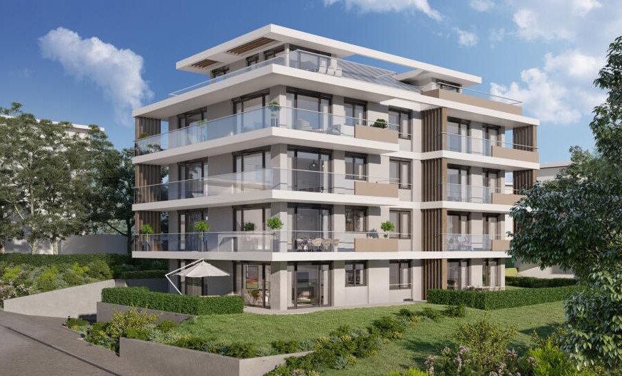 Modernes Mehrfamilienhaus mit großzügigen Balkonen und Garten