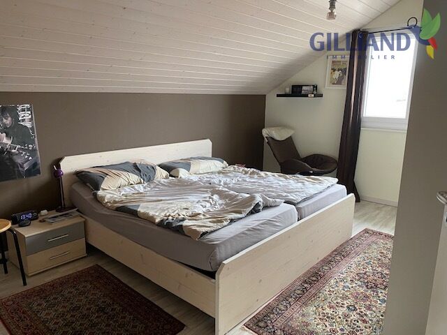 Schlafzimmer unter Dachschräge