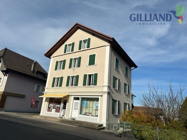 Mehrfamilienhaus mit Gewerbe im Erdgeschoss