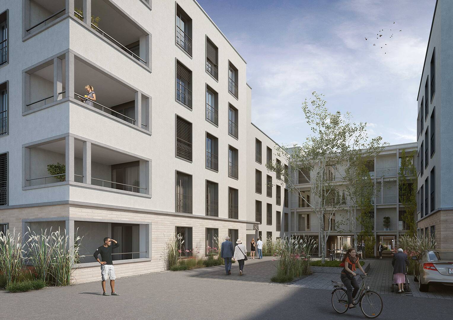 Modernes Wohngebäude mit begrüntem Innenhof