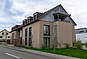 Modernes Wohnhaus mit Natursteinfassade