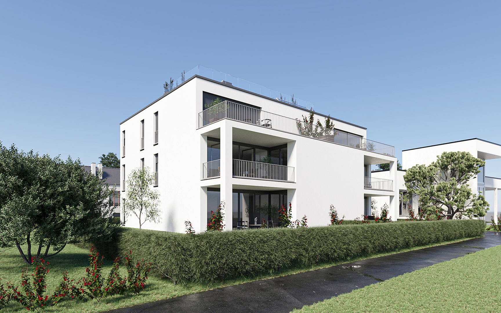 Moderne Wohnanlage mit Balkonen und Garten