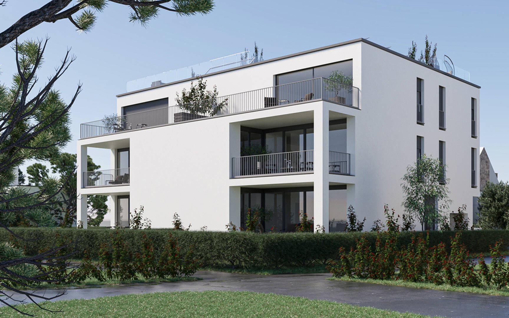 Modernes Mehrfamilienhaus mit Dachterrassen und Balkonen