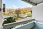 Balkon mit Blick ins Grüne und auf die Umgebung