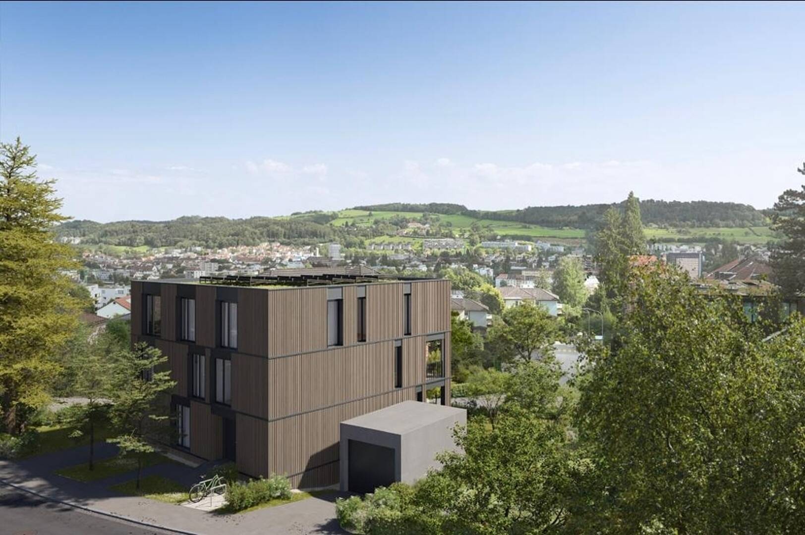 Modernes Wohngebäude in grüner Hanglage