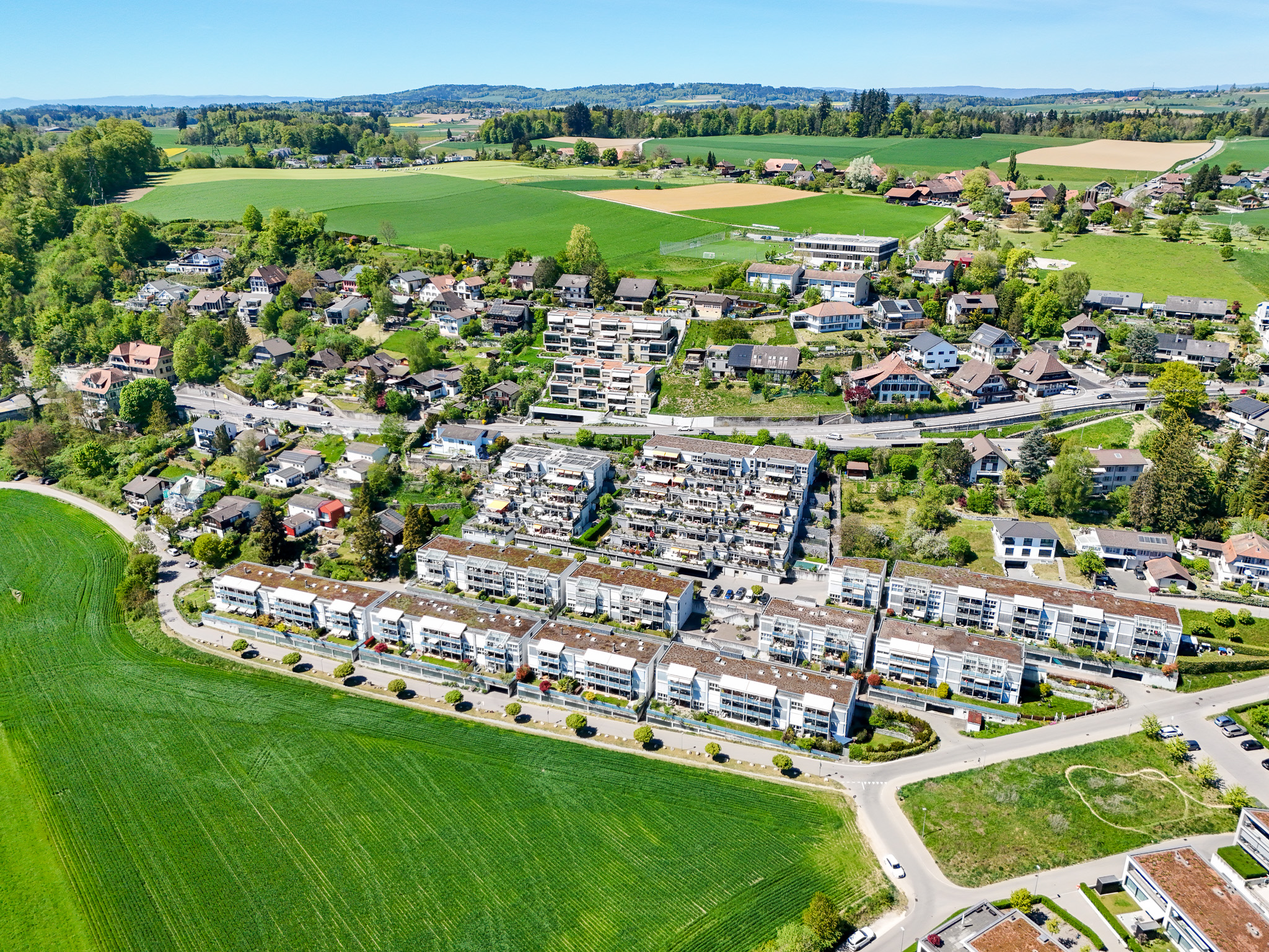 Luftaufnahme eines Wohnquartiers im Grünen
