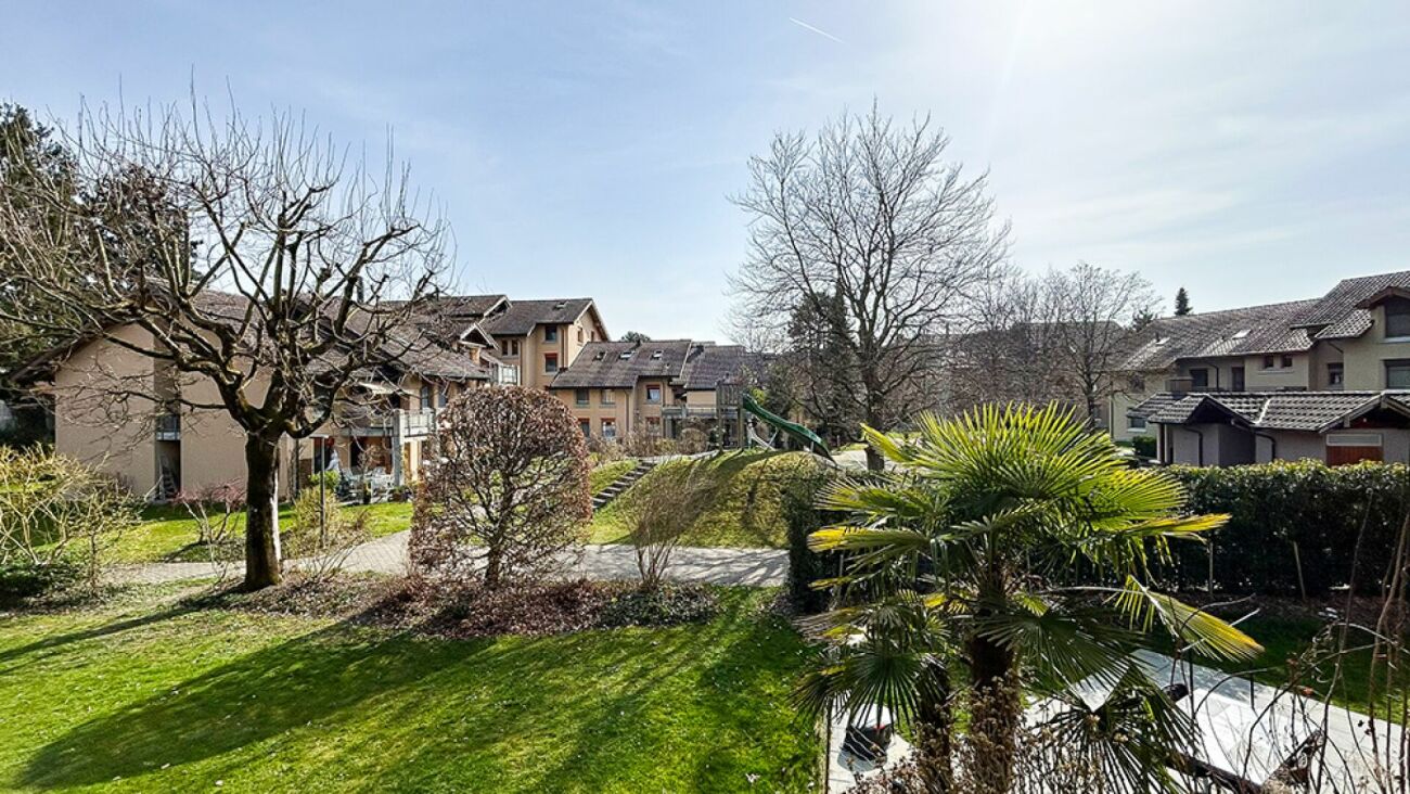 Wohnanlage mit Gartenblick
