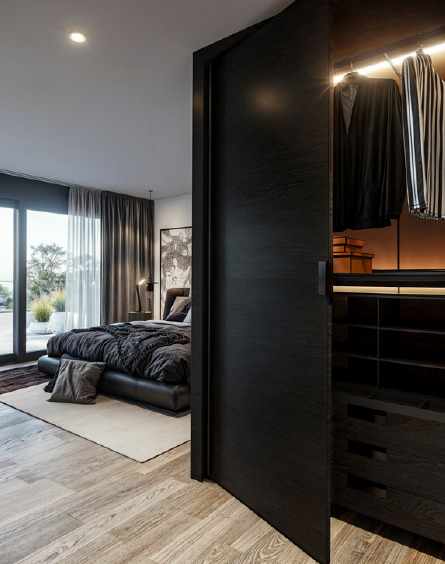 Modernes Schlafzimmer mit Ankleidebereich