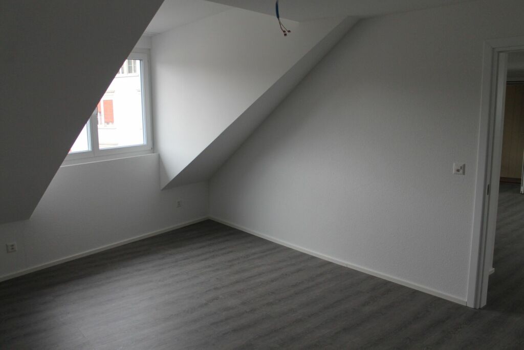 Dachgeschosszimmer mit Schrägen