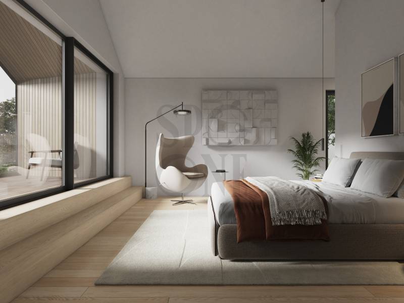 Modernes Schlafzimmer mit bodentiefen Fenstern