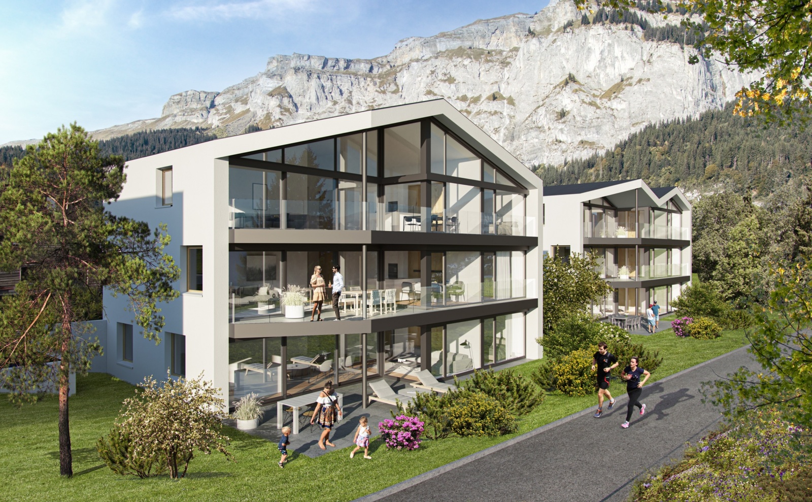 Moderne Wohnanlage in alpiner Landschaft