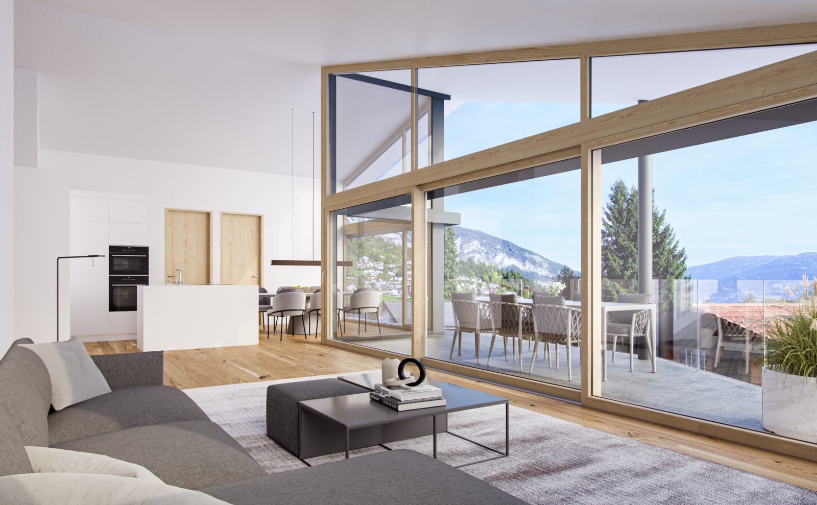 Offener Wohnbereich mit Panoramaverglasung und Alpenblick