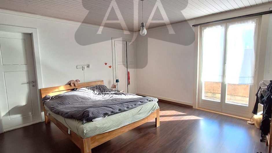 Schlafzimmer mit Balkonzugang