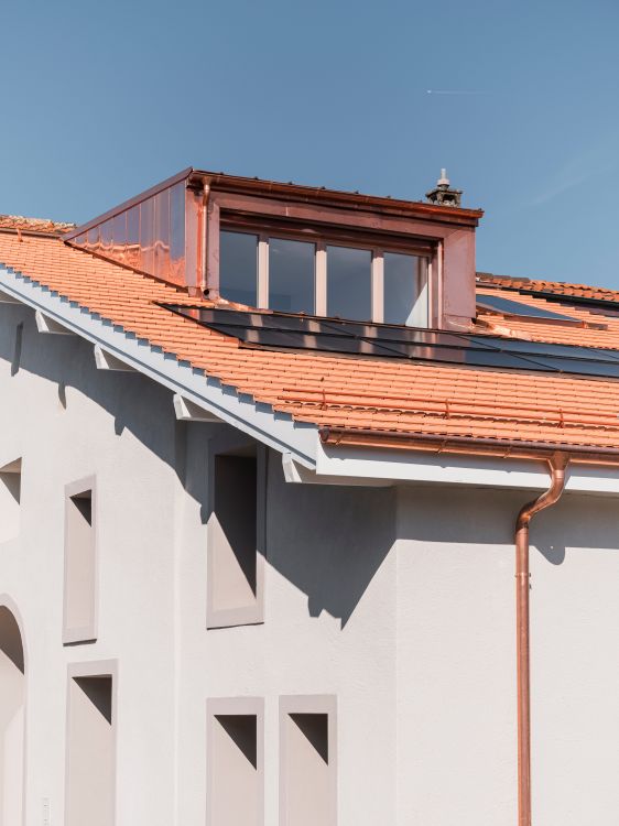 Dachgaube auf modernisiertem Satteldachhaus