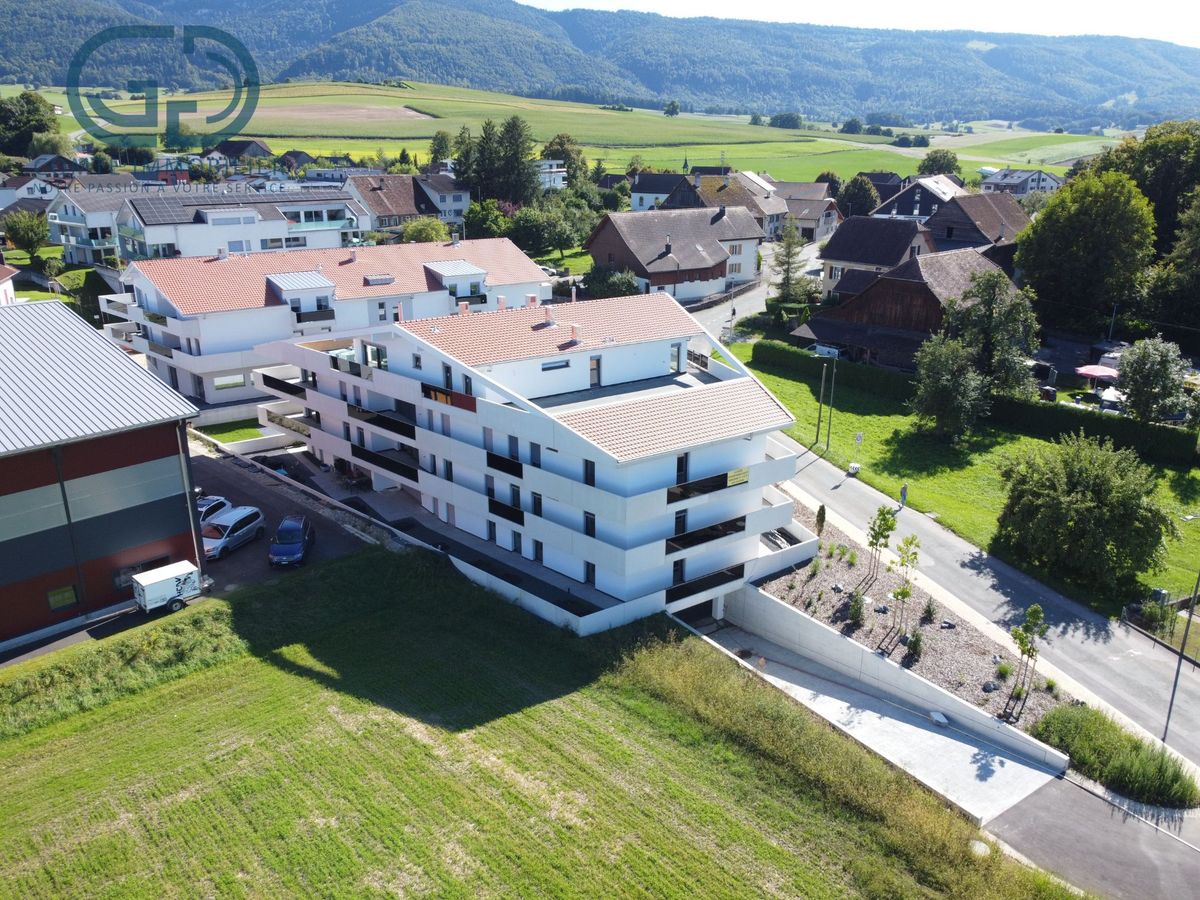 Wohnanlage in Hanglage mit Bergblick