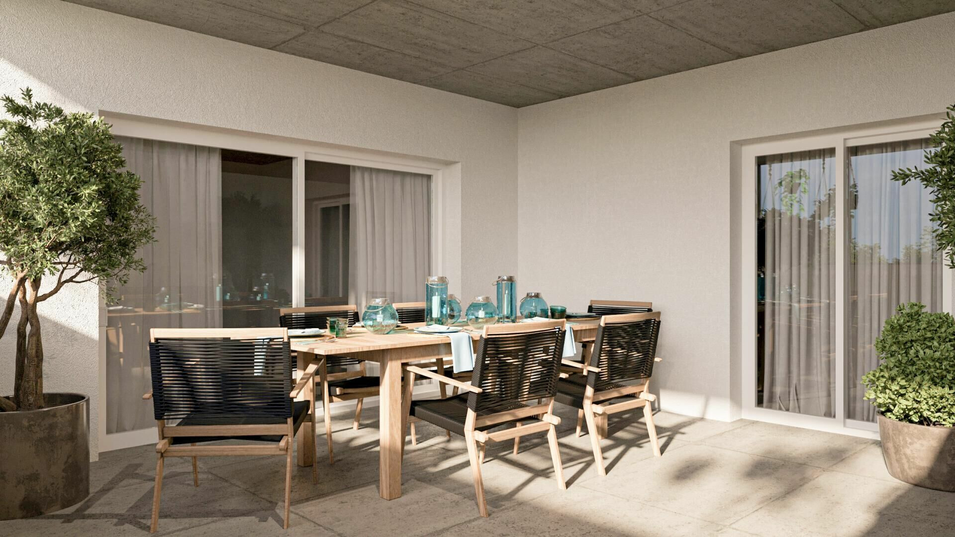 Überdachte Terrasse mit Esstisch
