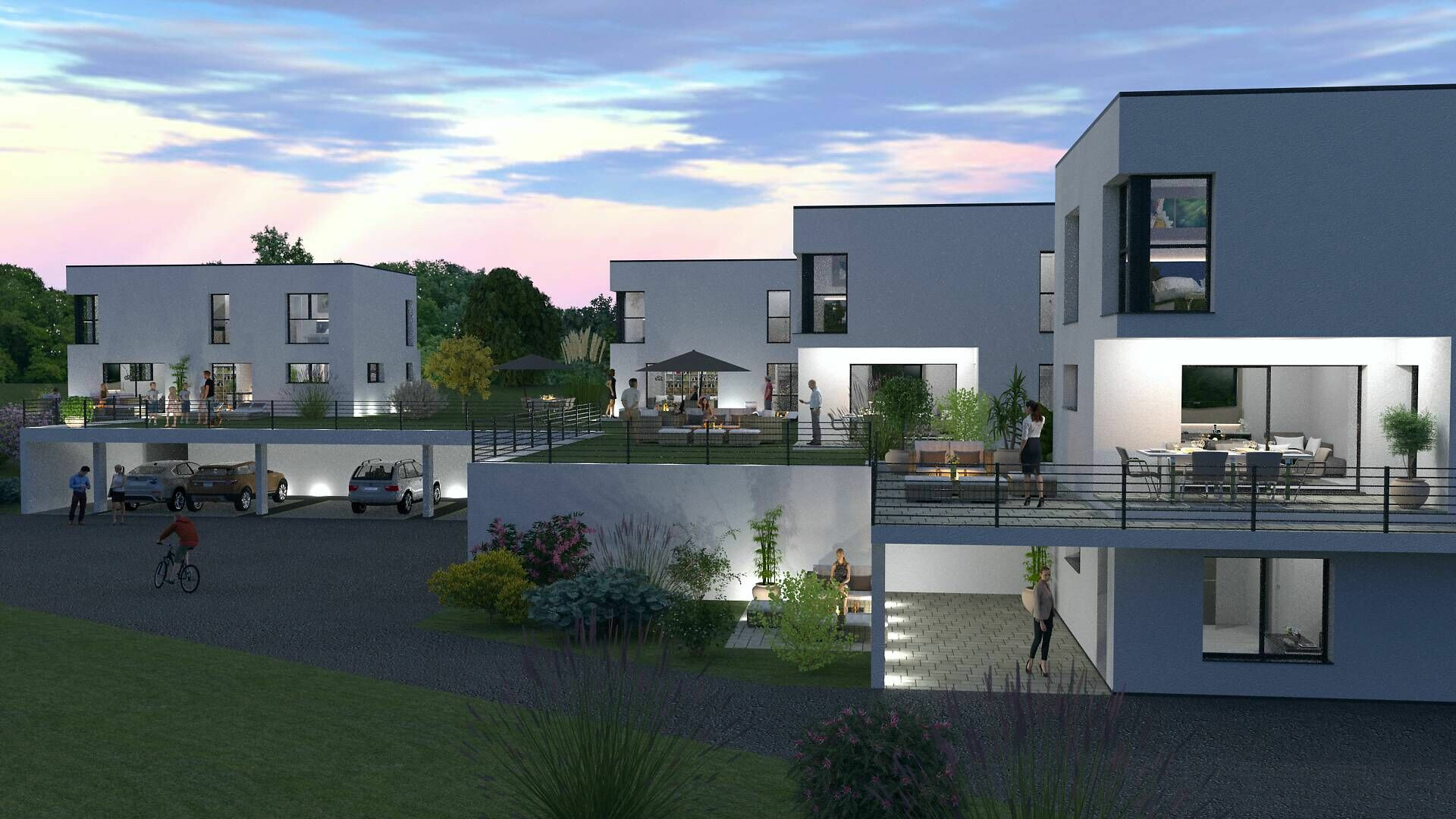 Moderne Wohnanlage mit Terrassen und Carports bei Abendlicht