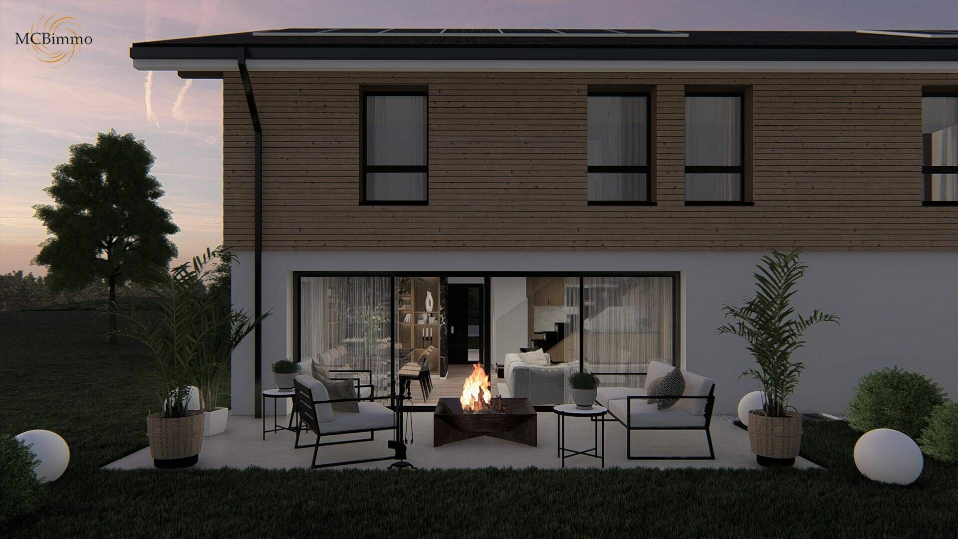 Modernes Einfamilienhaus mit Terrasse bei Abendlicht