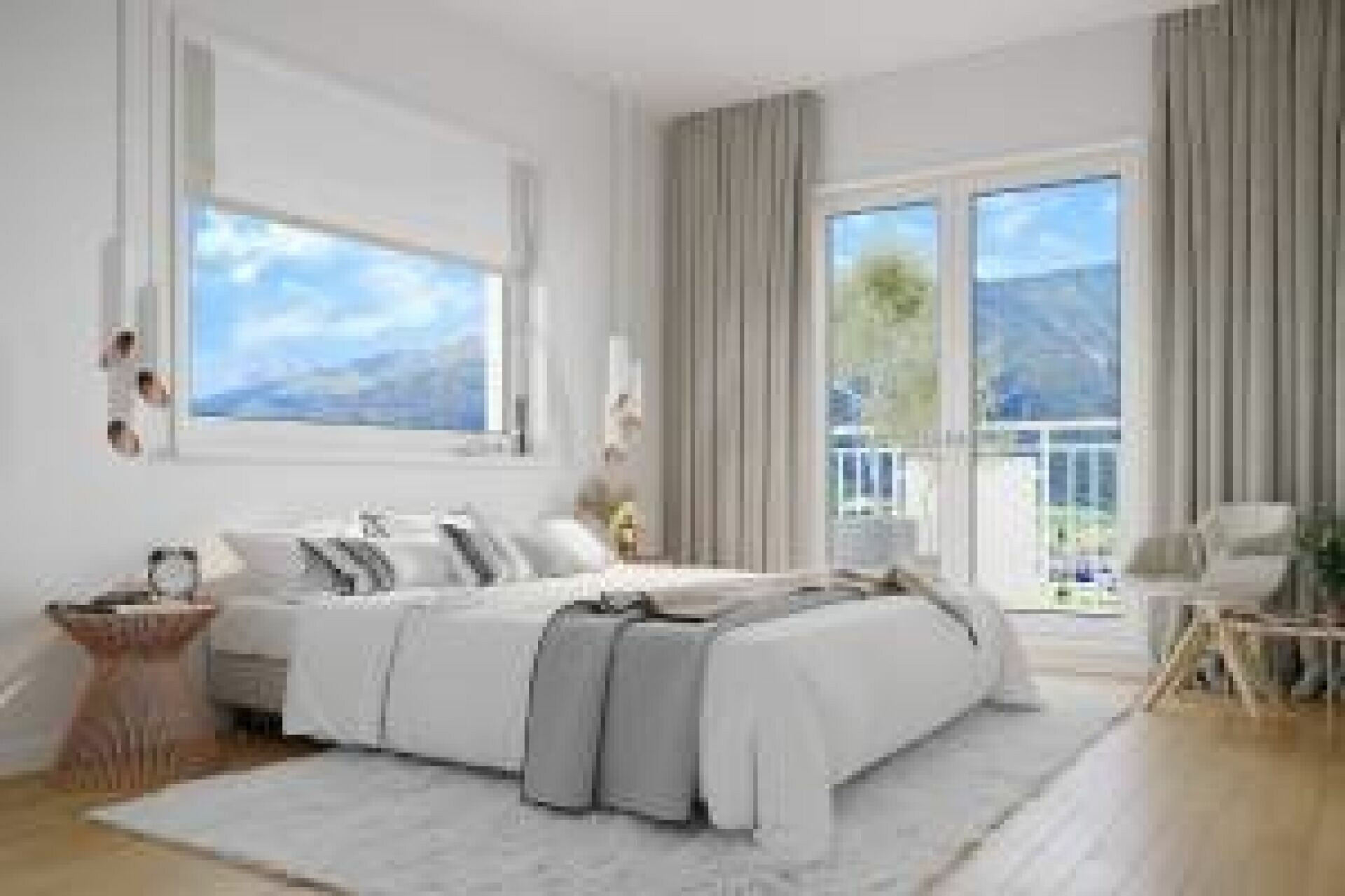 Helles Schlafzimmer mit Balkonblick