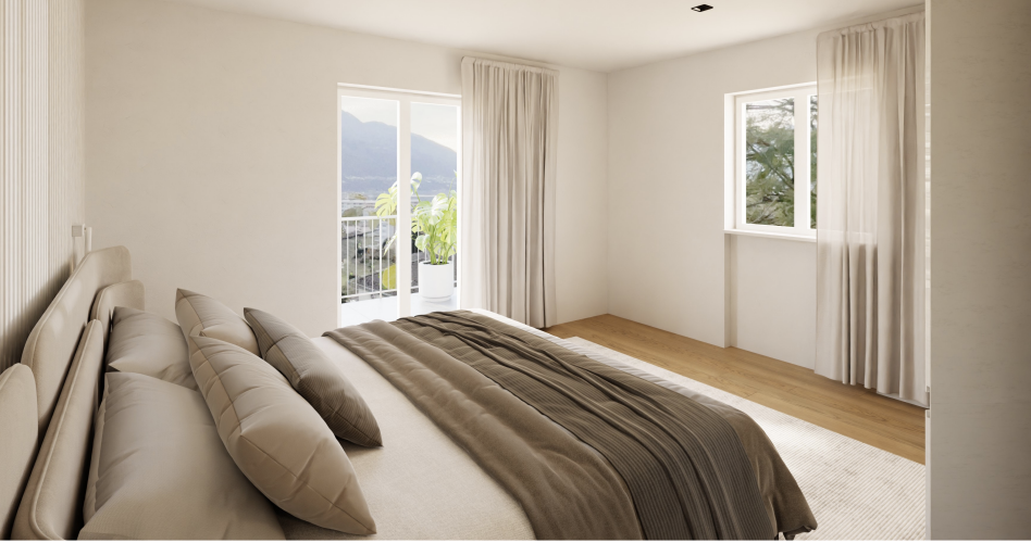 Helles Schlafzimmer mit Balkonblick
