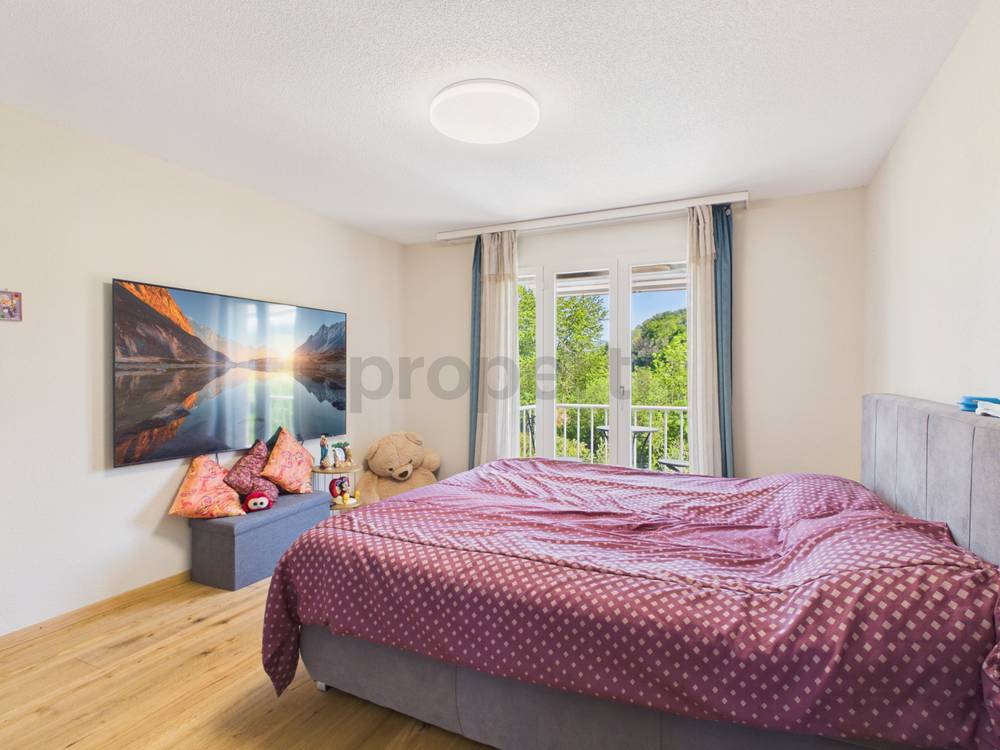 Schlafzimmer mit Balkonblick