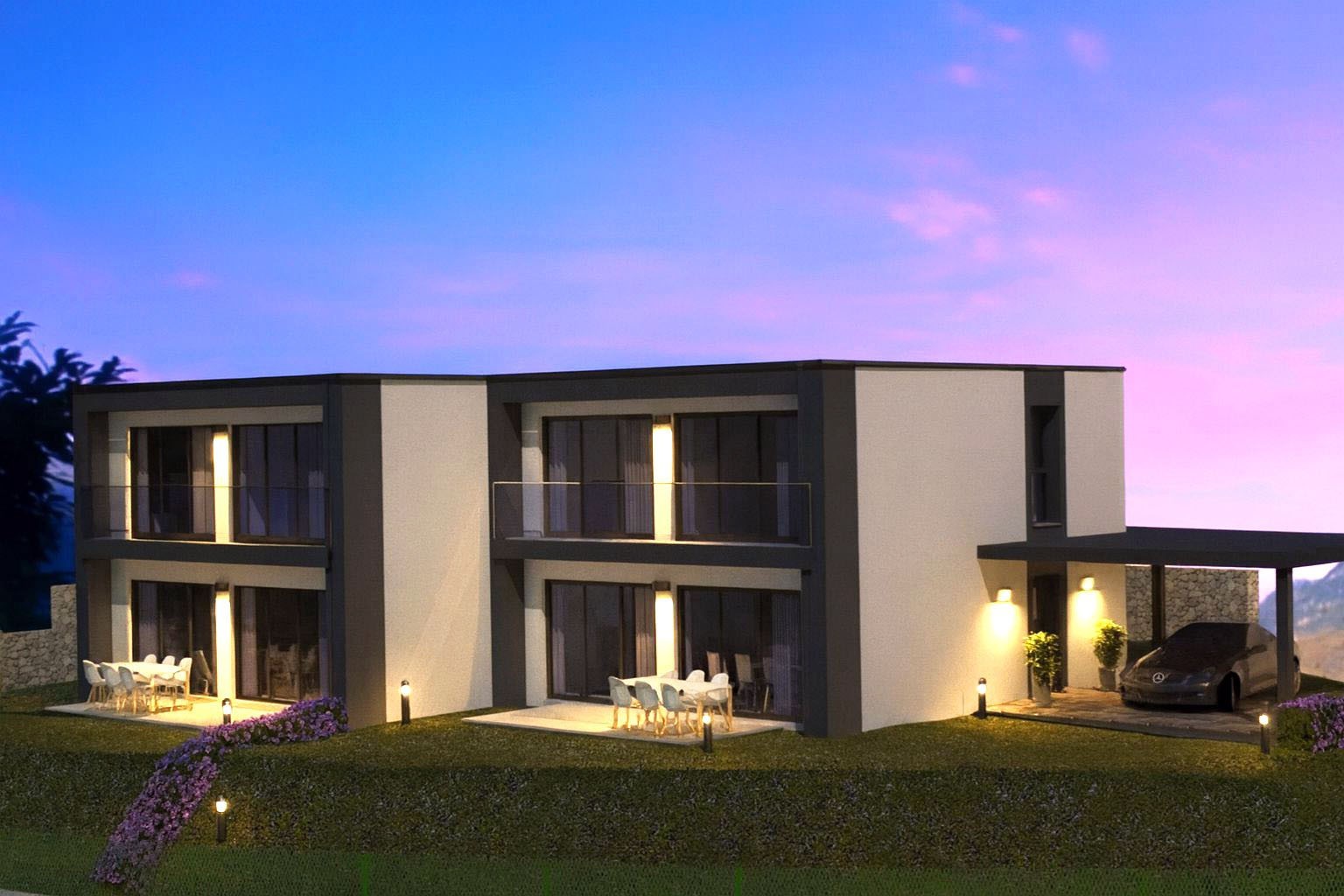 Modernes zweigeschossiges Wohnhaus mit Garten und Carport bei Dämmerung