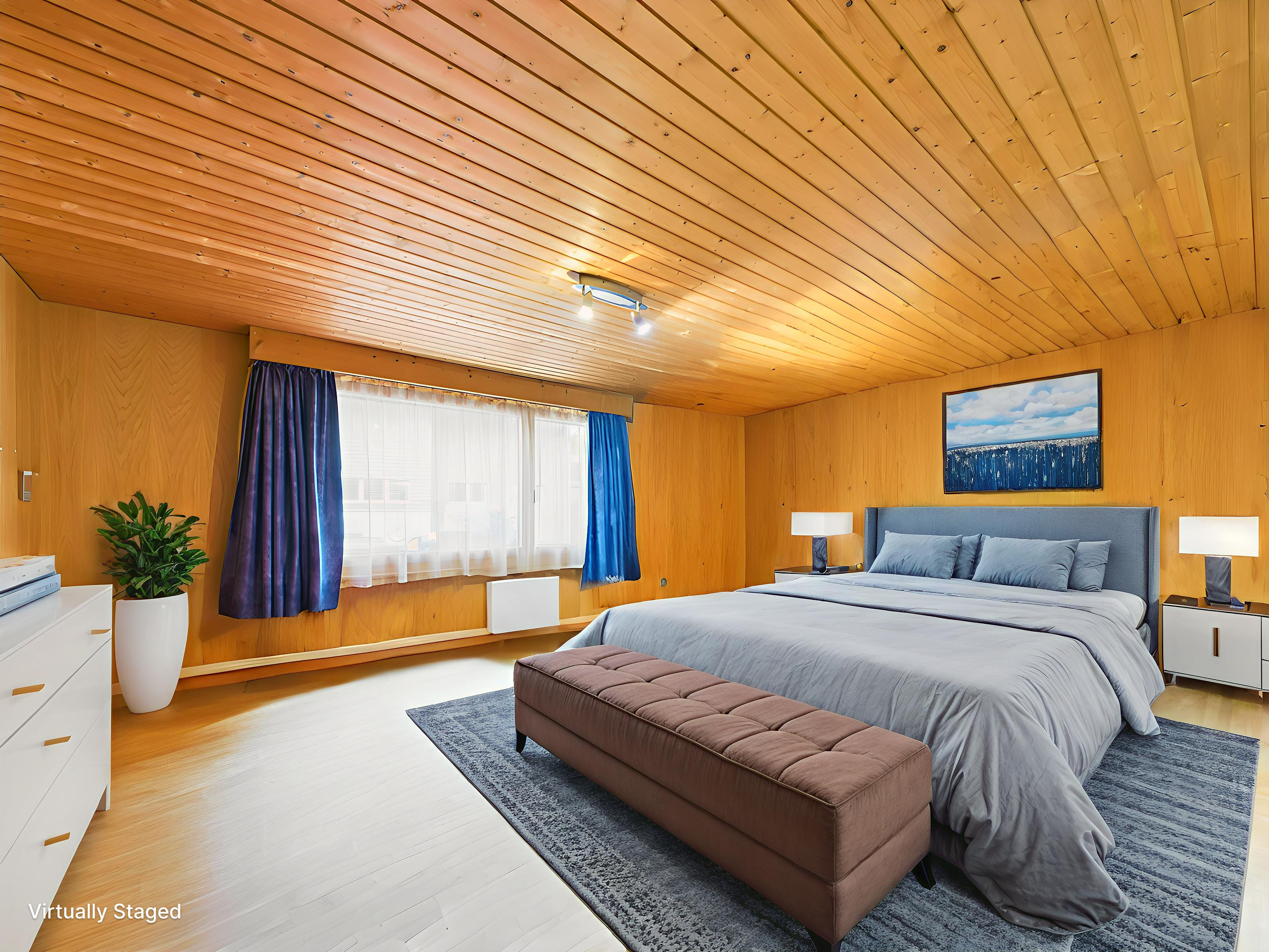 Schlafzimmer mit Holzdecke
