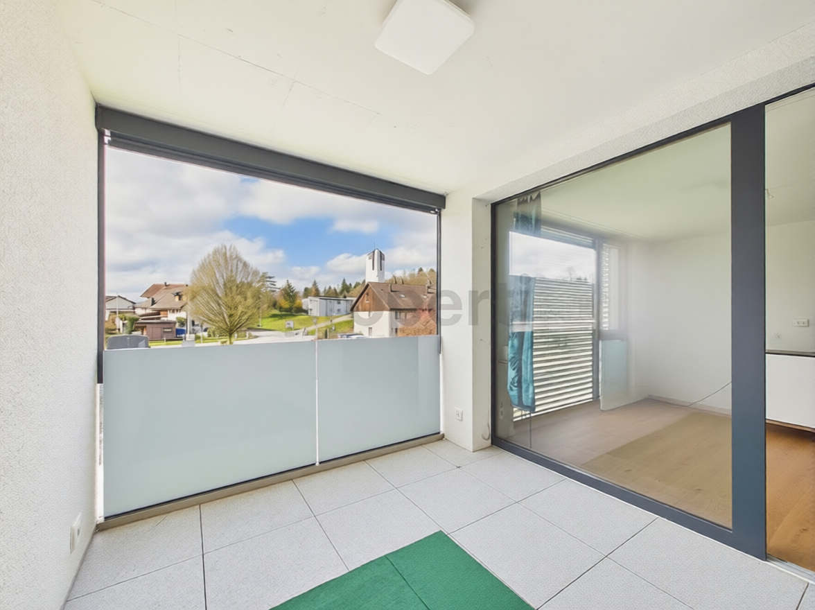 Verglaster Balkon mit Ausblick