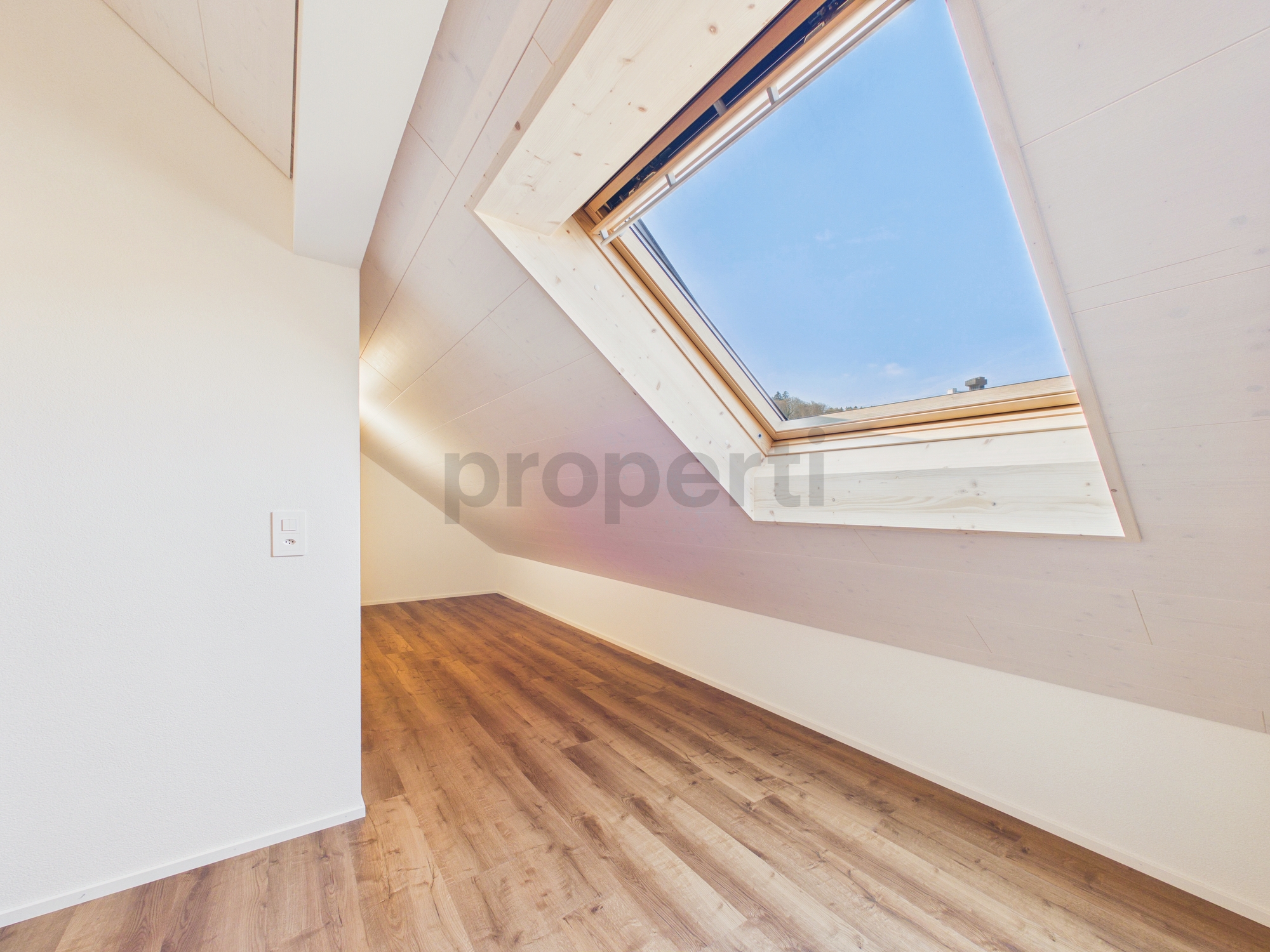Dachzimmer mit Dachflächenfenster