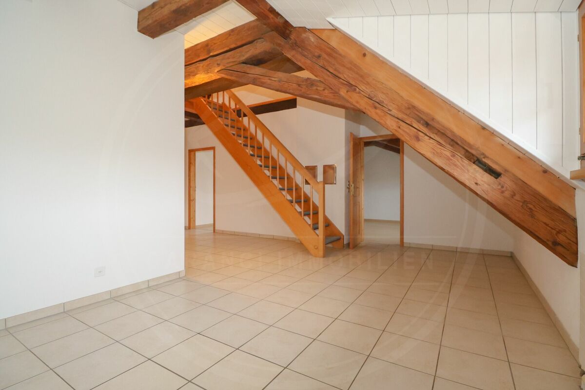 Ausgebauter Dachraum mit Treppe
