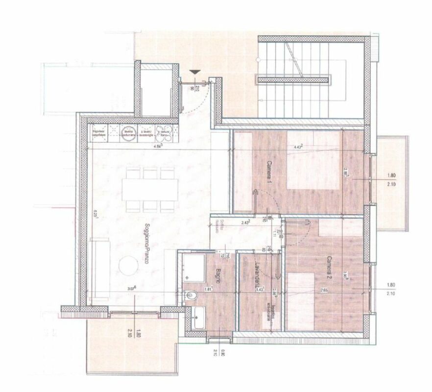 Grundriss einer Wohnung mit Wohn-Essbereich, zwei Schlafzimmern und Servicezonen