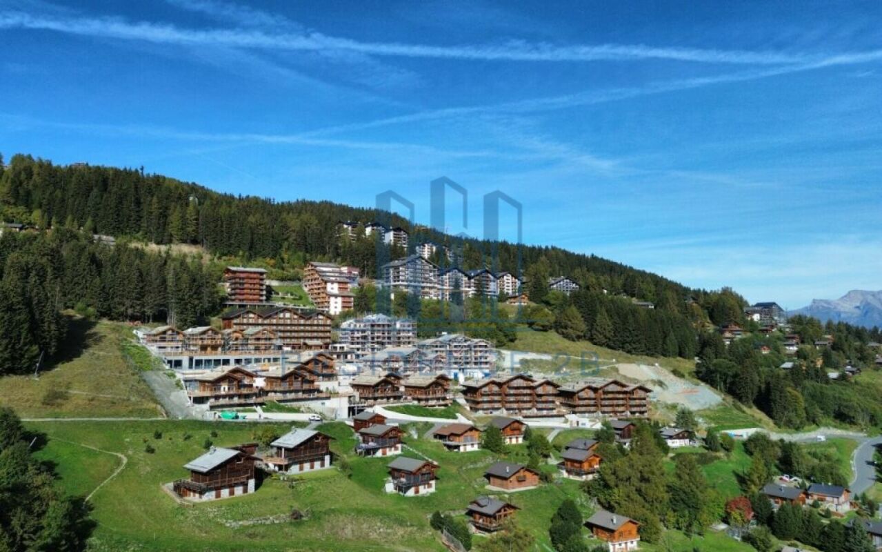Berglandschaft mit Chalet-Siedlung