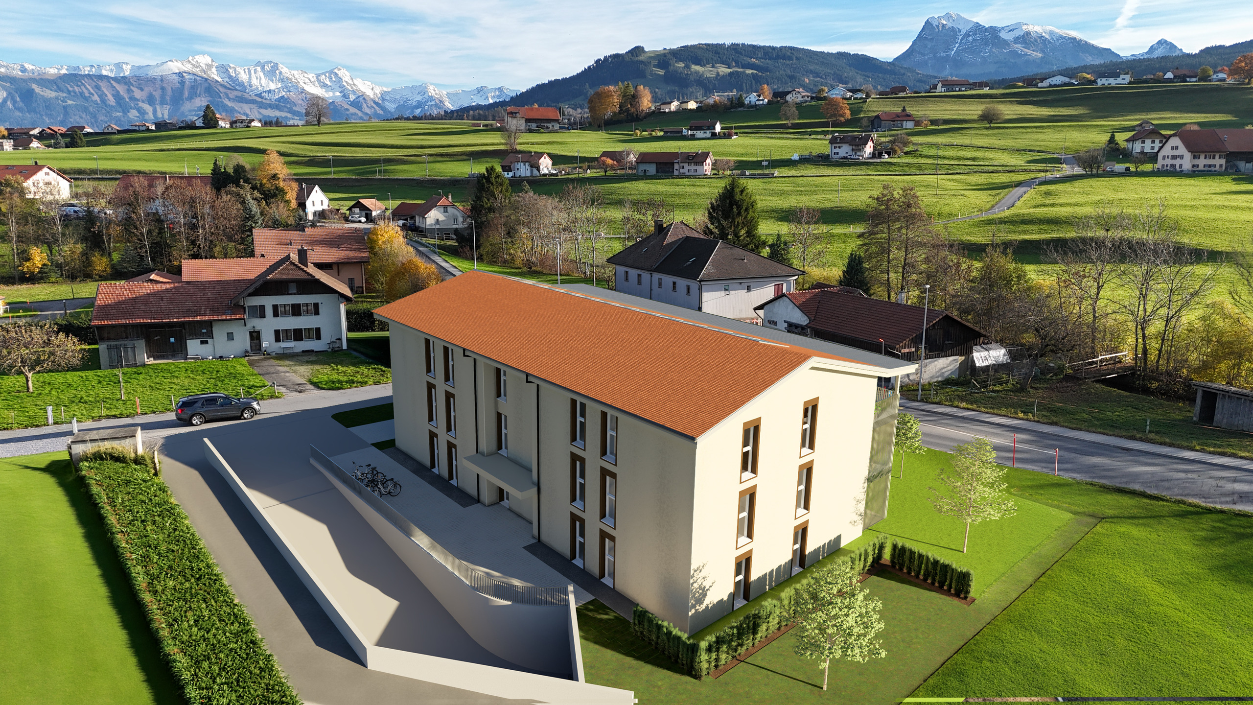 Luftaufnahme eines modernen Wohnhauses in alpiner Landschaft