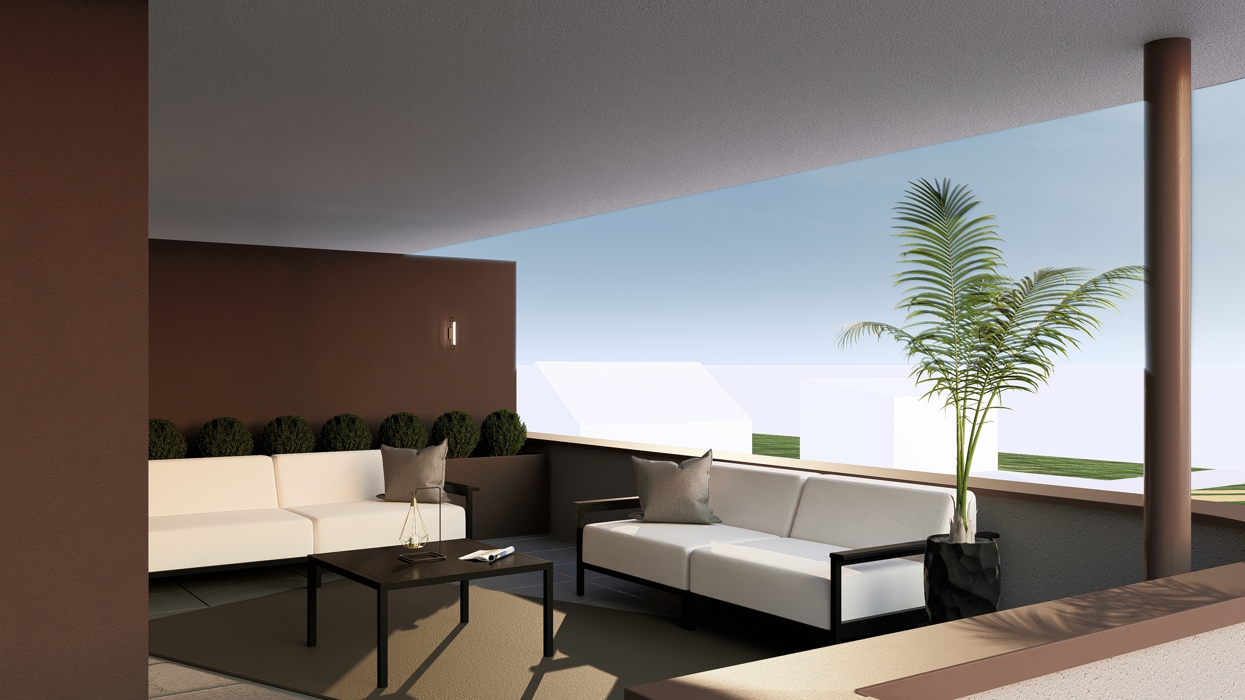 Überdachte Terrasse mit Lounge-Möbeln