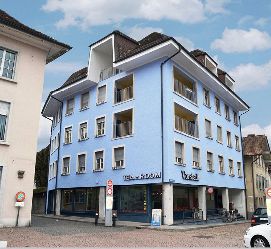 Mehrfamilienhaus mit Ladenlokal im Erdgeschoss