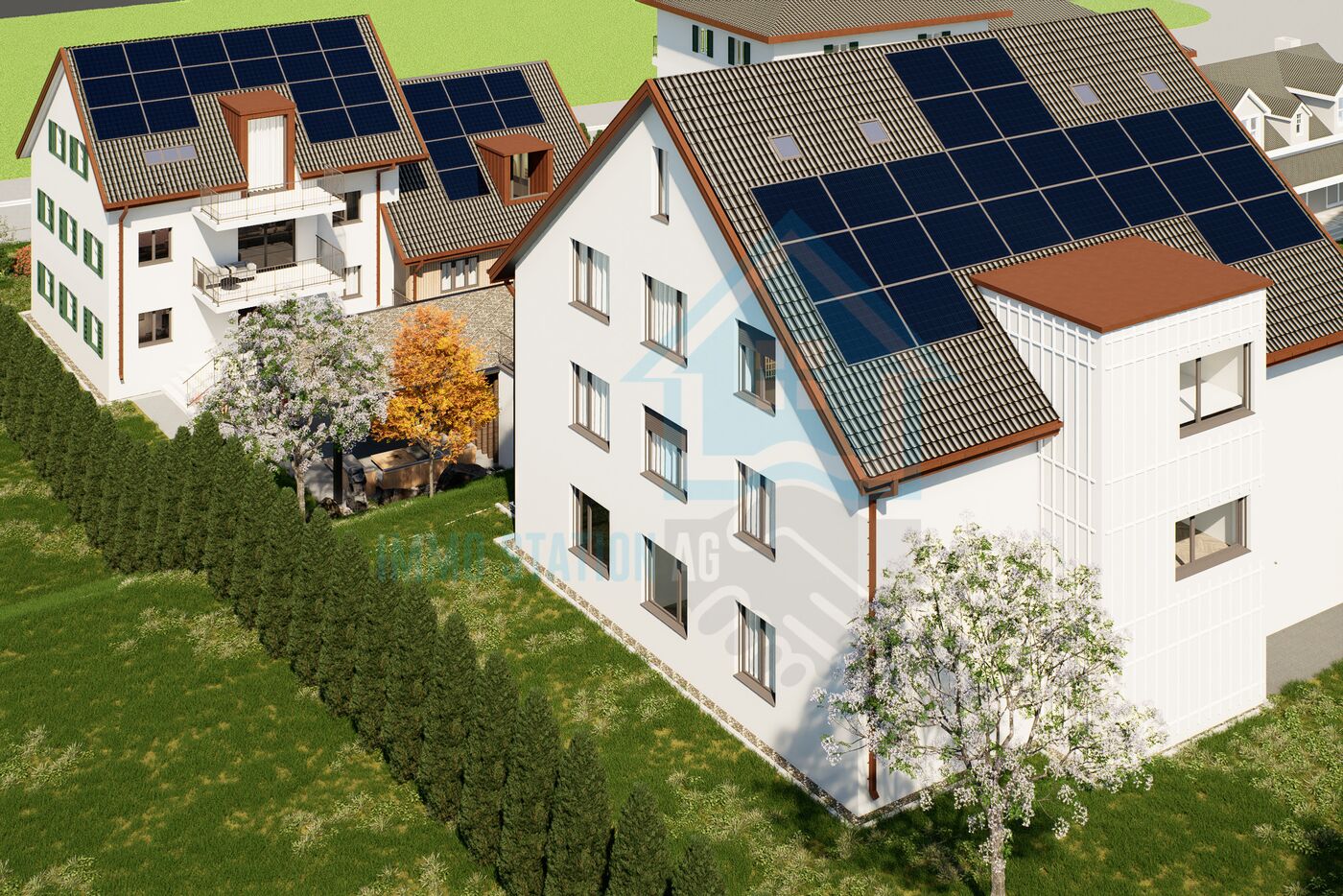 Mehrfamilienhaus mit Solardach in grüner Wohnumgebung