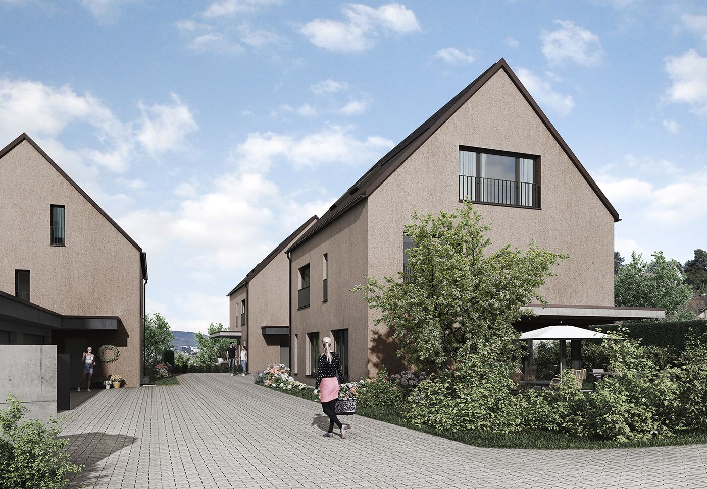 Moderne Reihenhausanlage mit Garten und Zufahrt