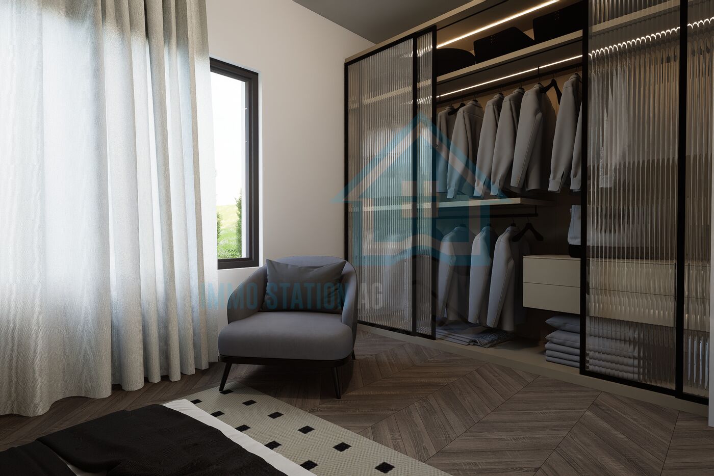 Ankleidezimmer mit Schrankwand und Sesseln