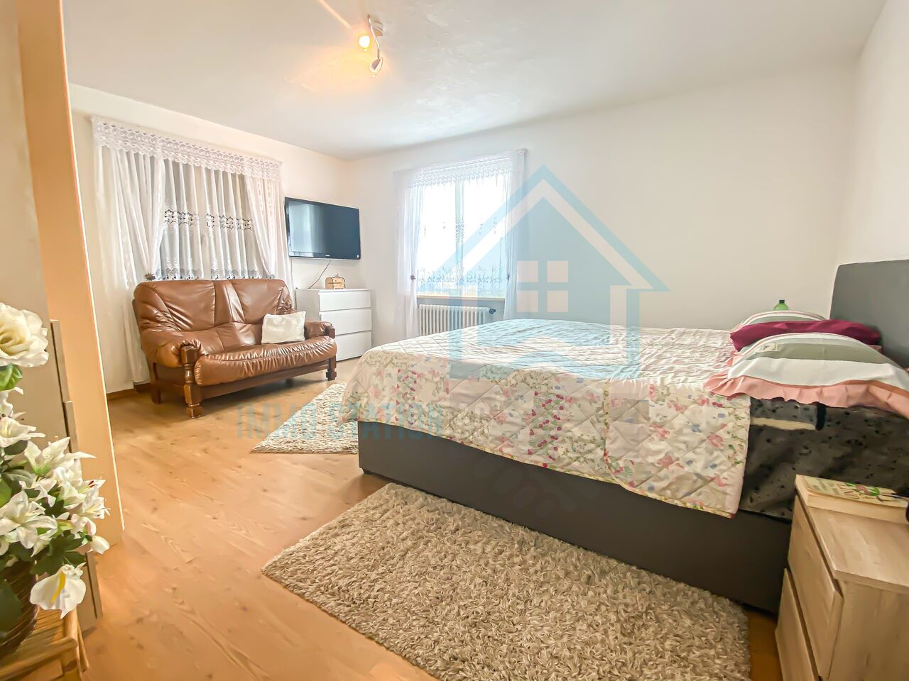 Schlafzimmer mit Sitzbereich