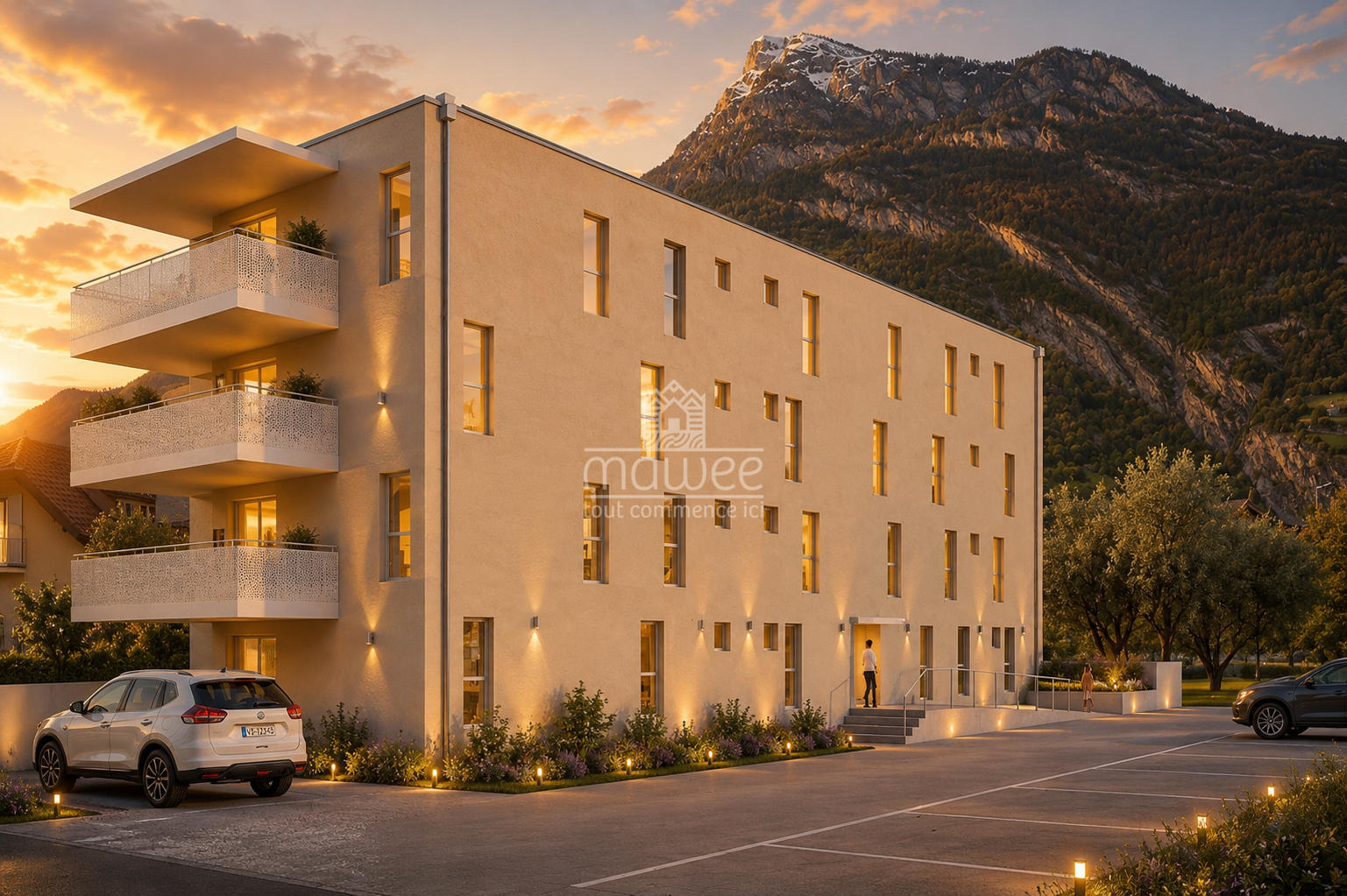 Modernes Mehrfamilienhaus in Berglage bei Sonnenuntergang