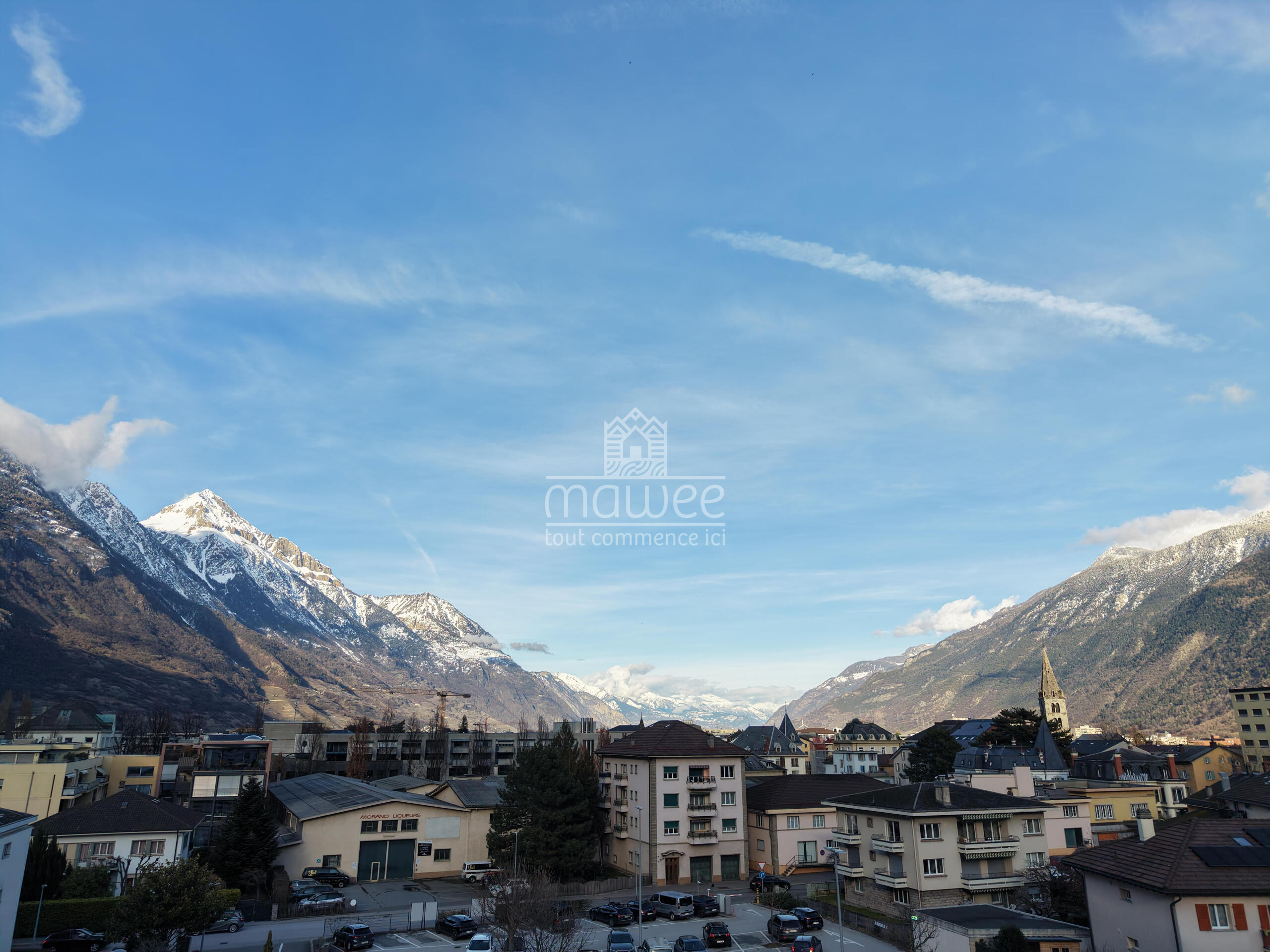 Stadtblick auf Alpenpanorama