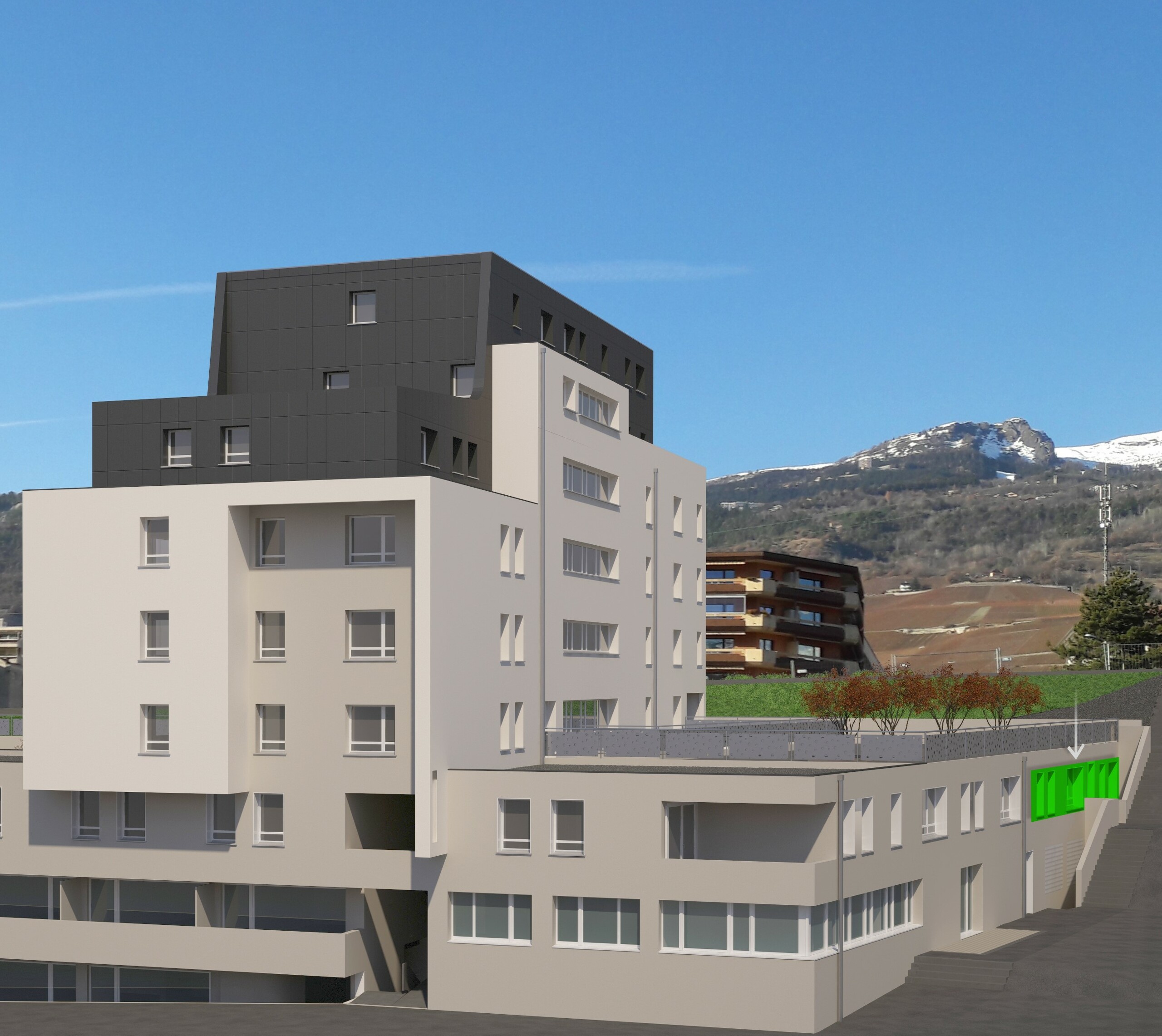 Modernes Mehrfamilienhaus mit Bergkulisse