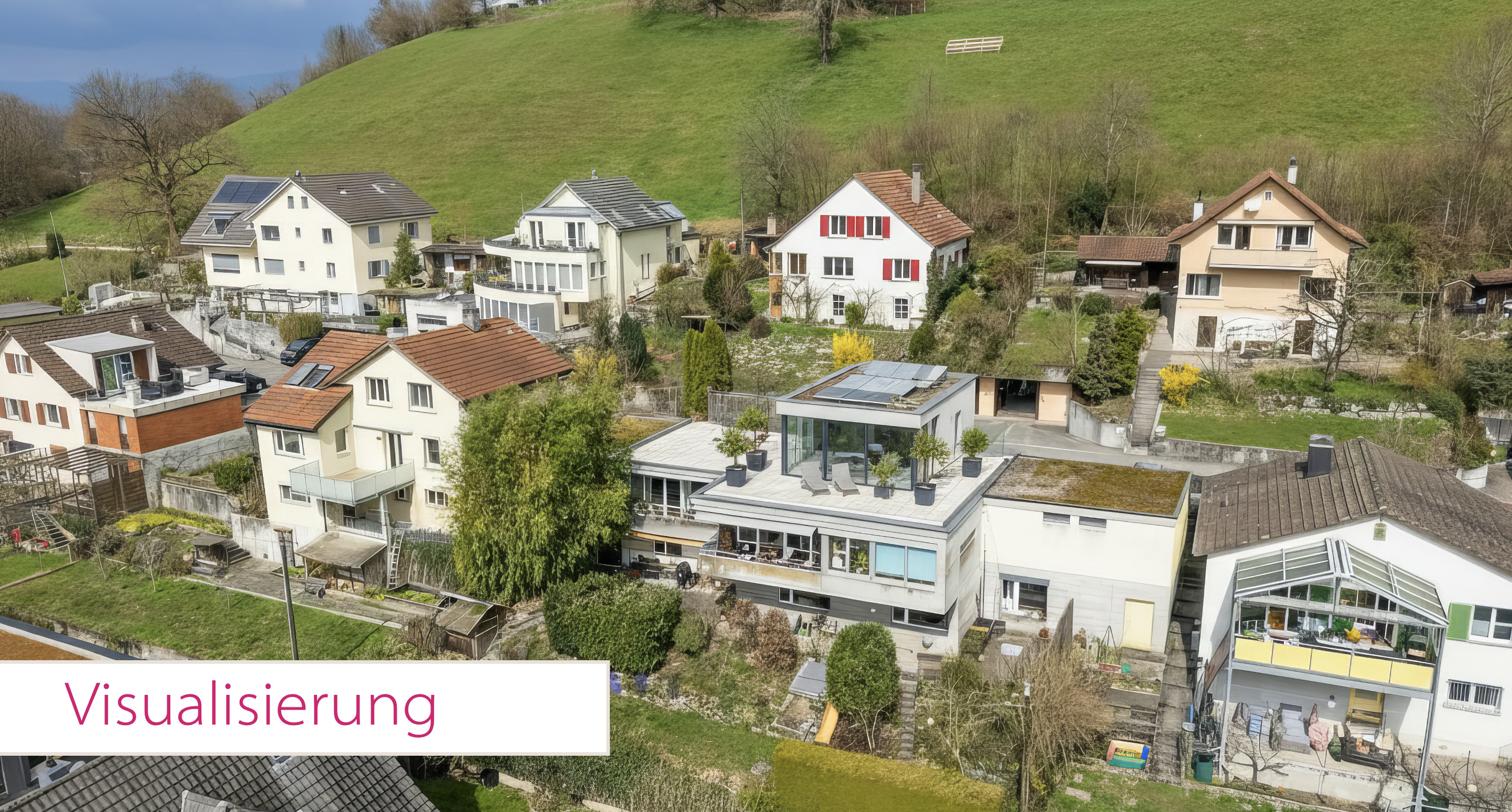 Luftaufnahme einer Wohnsiedlung am Hang