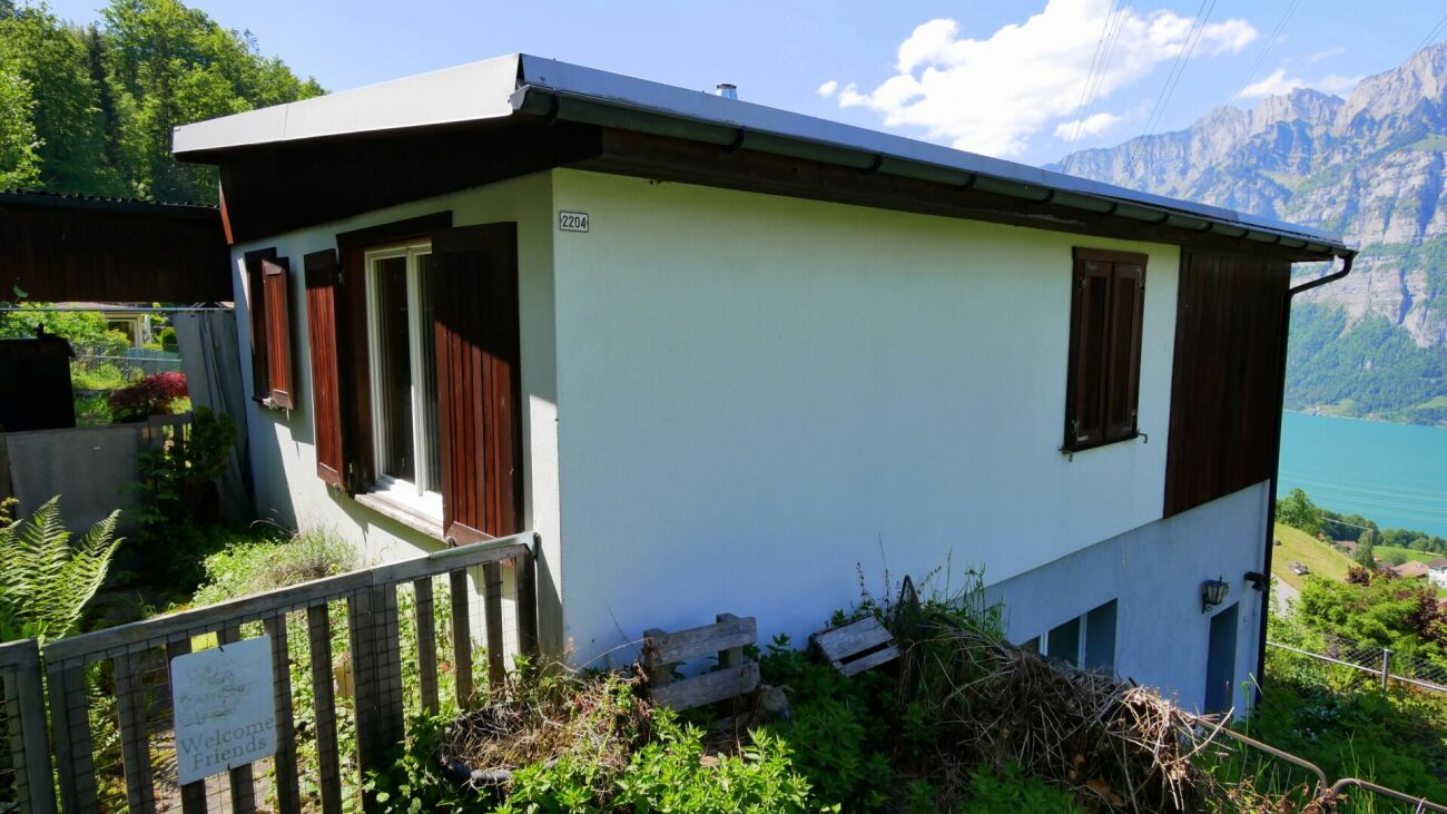 Haus mit Seeblick und Bergpanorama