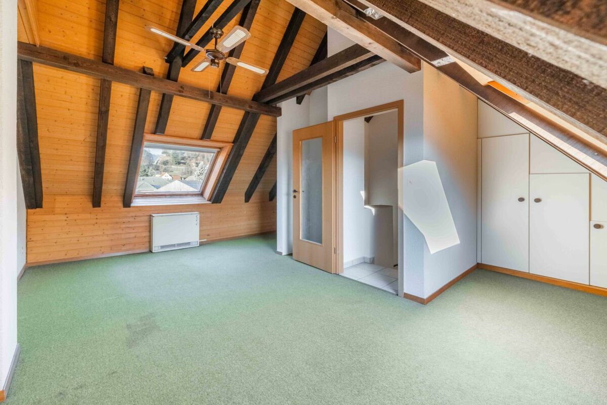 Ausgebautes Dachgeschoss mit Sichtbalken
