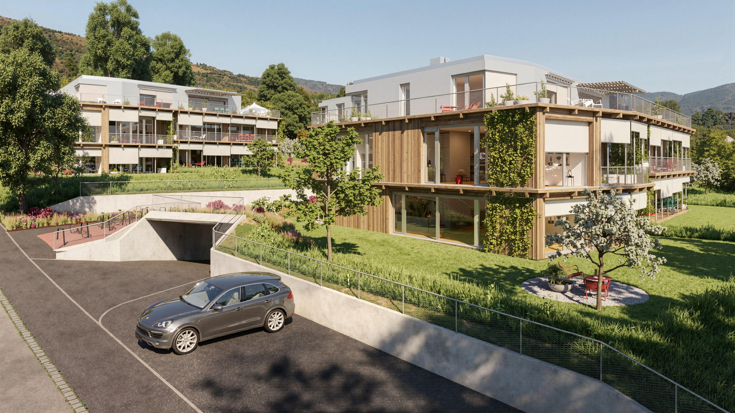 Moderne Wohnanlage mit Terrassen und Grünflächen
